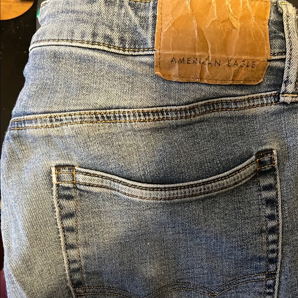American Eagle Outfitters Blue Jeans with Vintage Wash and Leather Patch